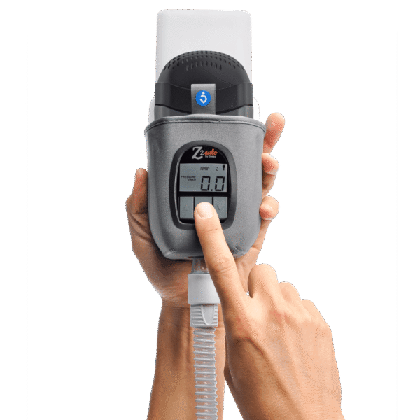 Breas Z2 Auto quiet auto adjusting travel CPAP held in hand