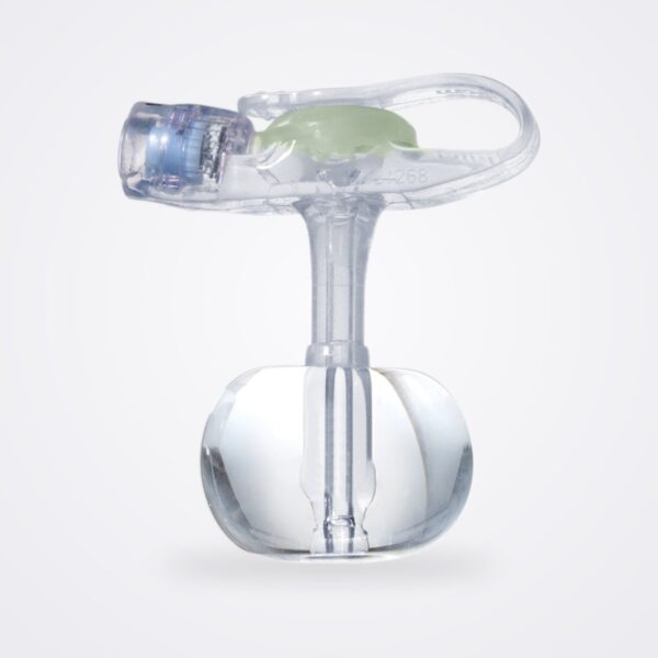 Rehabilitation & Recovery 33 AMT MiniONE Balloon Button low-profile G-tube with green feed port and inflated balloon