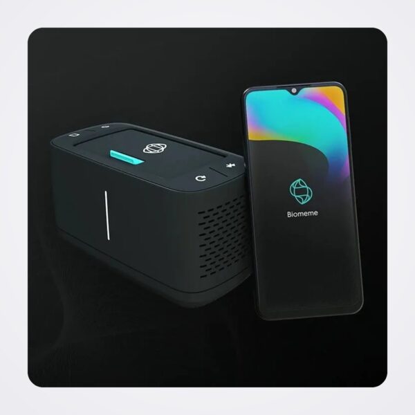 Biomeme Franklin real-time PCR thermocycler beside a smartphone running the Biomeme app