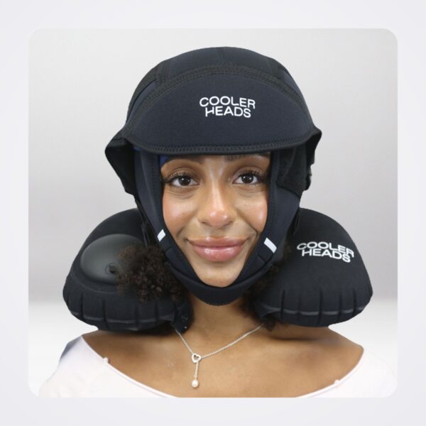 Woman wearing the Amma Cooling Wrap and Cooler Heads compression cap