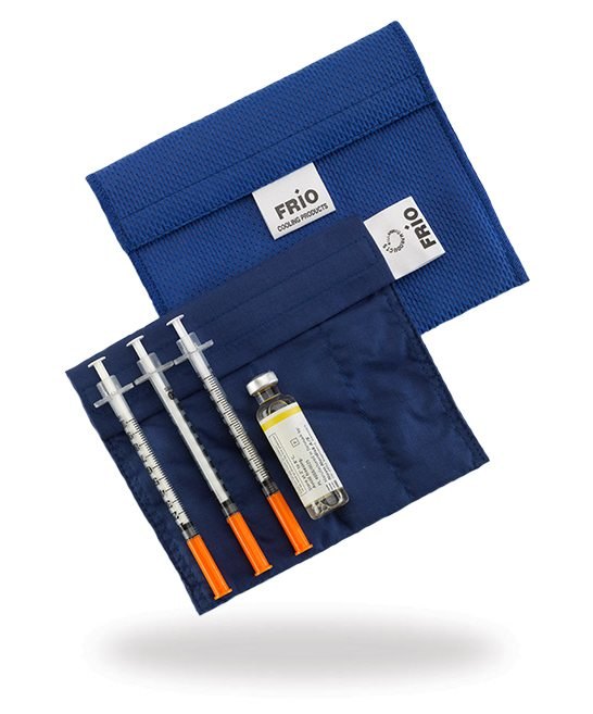 FRIO Evaporative Cooling Wallets for Insulin and Injectables 3 Navy FRIO cooling wallet open with three syringes and a vial inside its inner wallet