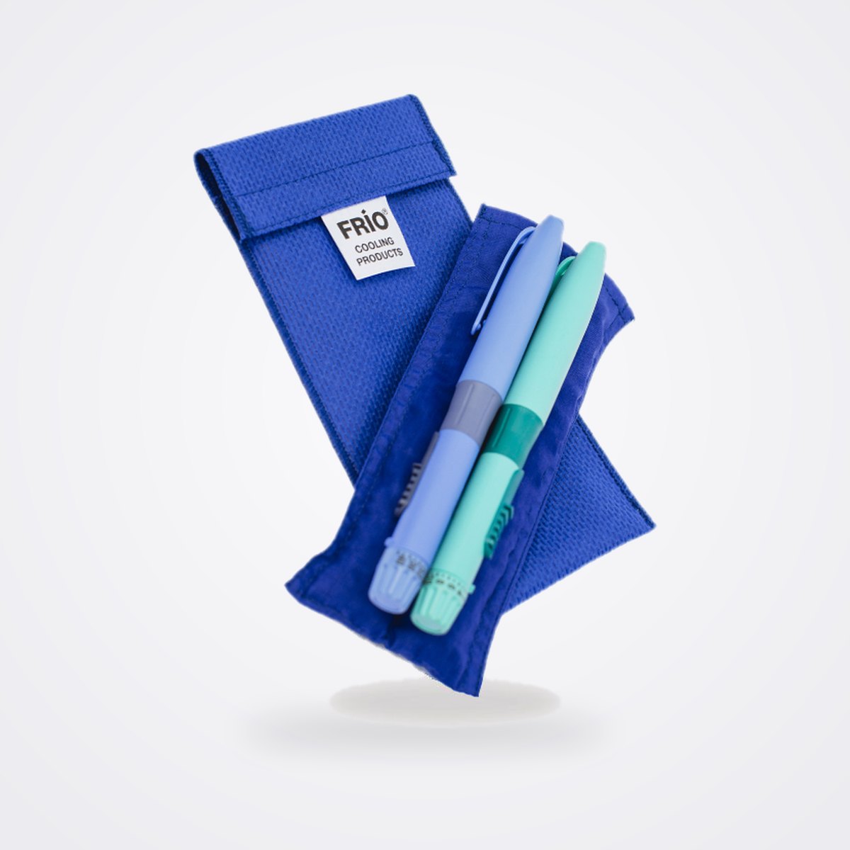 FRIO Evaporative Cooling Wallets for Insulin and Injectables 1 Blue FRIO Individual cooling wallet holding two insulin pens, shown with its outer cover