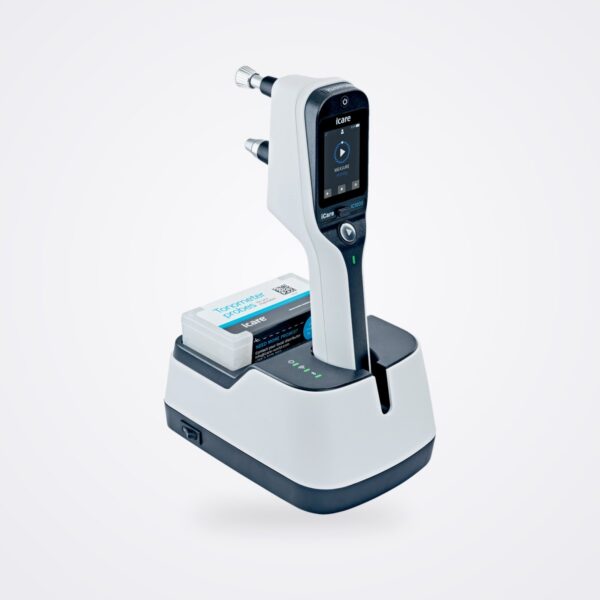 iCare IC1000 handheld tonometer standing in its SmartCradle with a probe box, on a white background