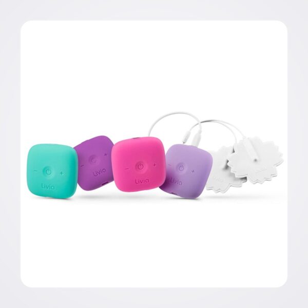 Livia TENS devices in teal, purple, pink and lavender with white flower-shaped pads