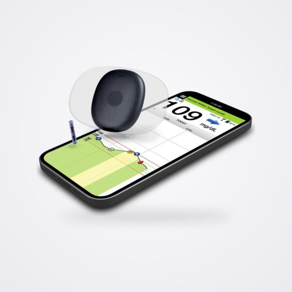 Eversense 365 smart transmitter resting on a smartphone showing the glucose app