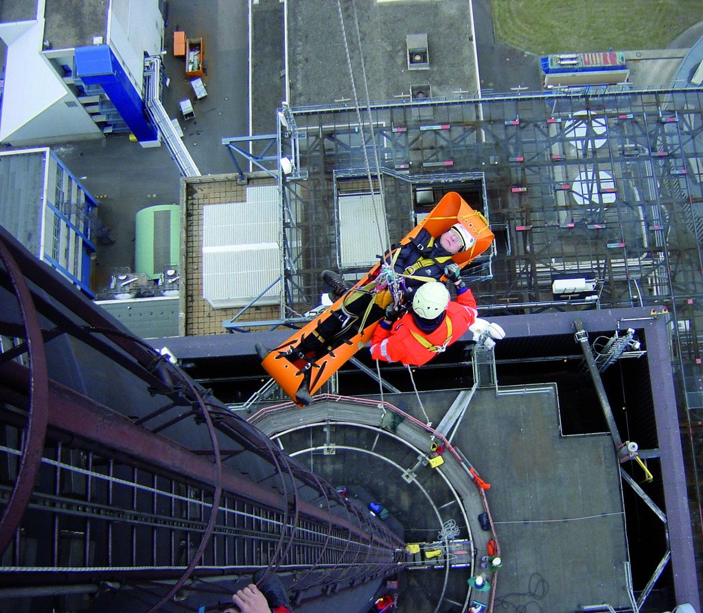 Skedco Sked Basic Rescue System Roll-Up Rescue Stretcher 4 Vertical lift of a Sked stretcher down a tall industrial structure