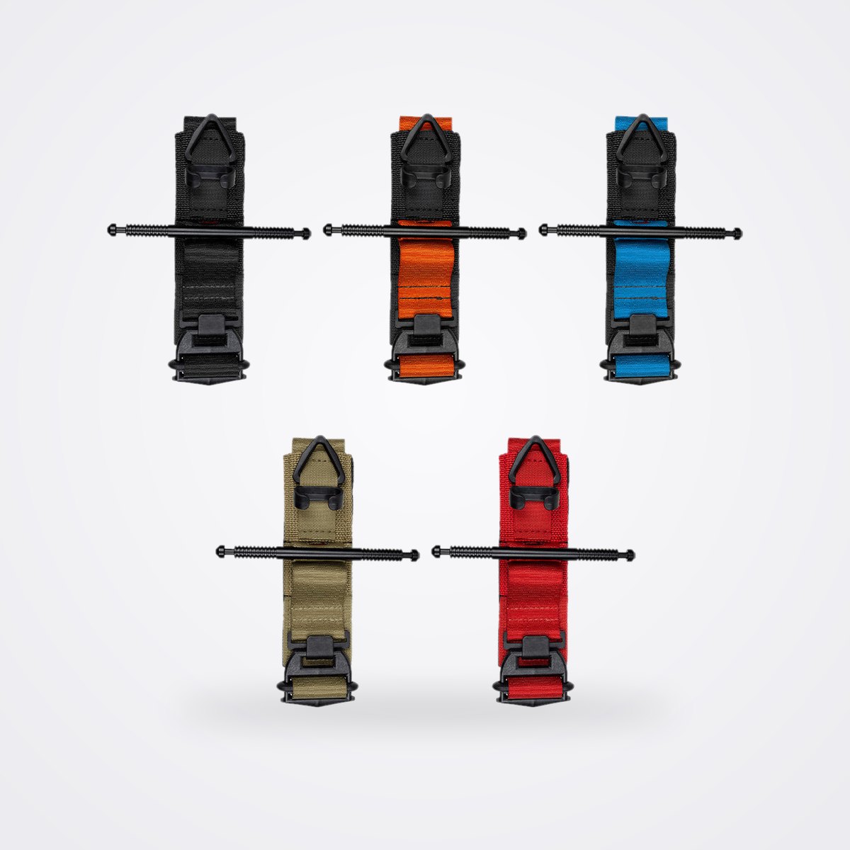 TacMed Solutions SOF Tourniquet (SOFTT-Wide) Extremity Tourniquet 1 SOF Tourniquet in black, orange, trainer blue, tan and red, laid open with aluminium windlass