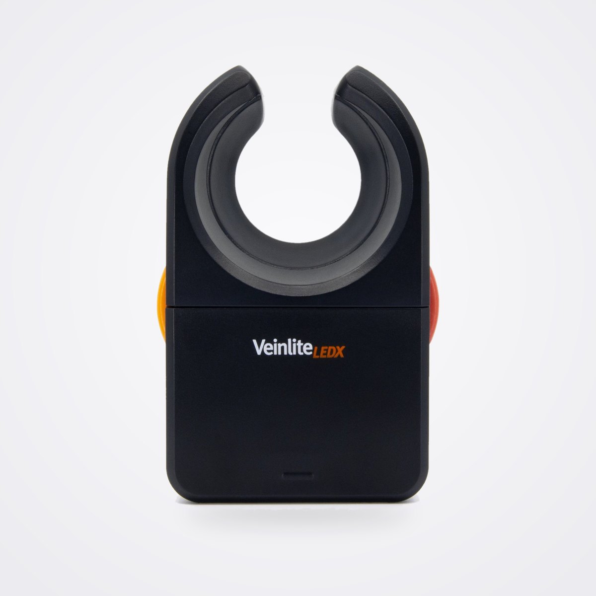 TransLite Veinlite LEDX Transilluminator for Sclerotherapy and Vein Access 1 Veinlite LEDX handheld transilluminator, front view showing the C shaped opening and orange and red buttons