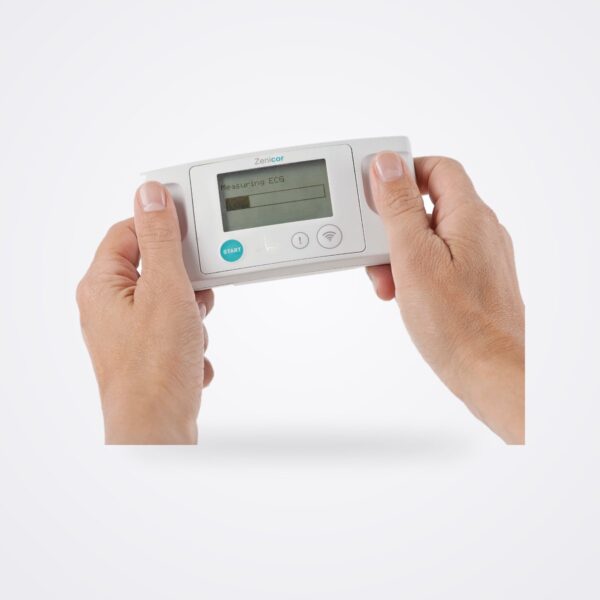 Zenicor One handheld thumb ECG held with both thumbs on the electrodes, white background